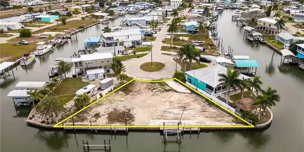 Image 3: Aerial view of residential area and canal