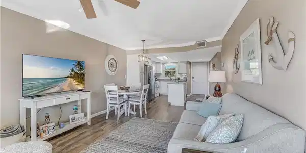 Image 4: The open-concept layout is perfect for both relaxing and entertaining.