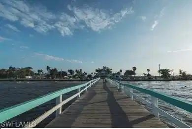Image 3: Dock area featuring a water view