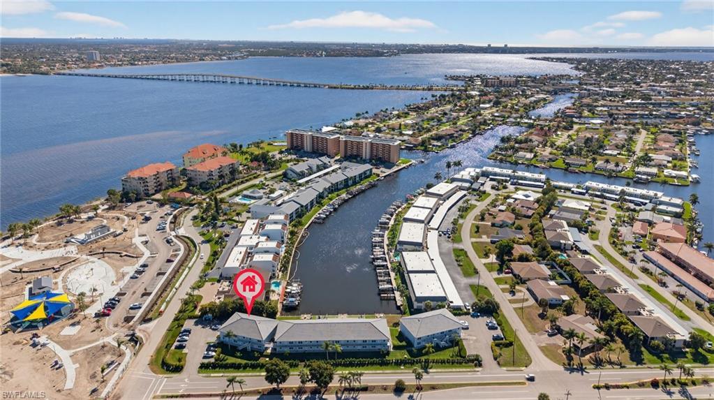 Image 1: View of property location with a notable bridge and a nearby body of water