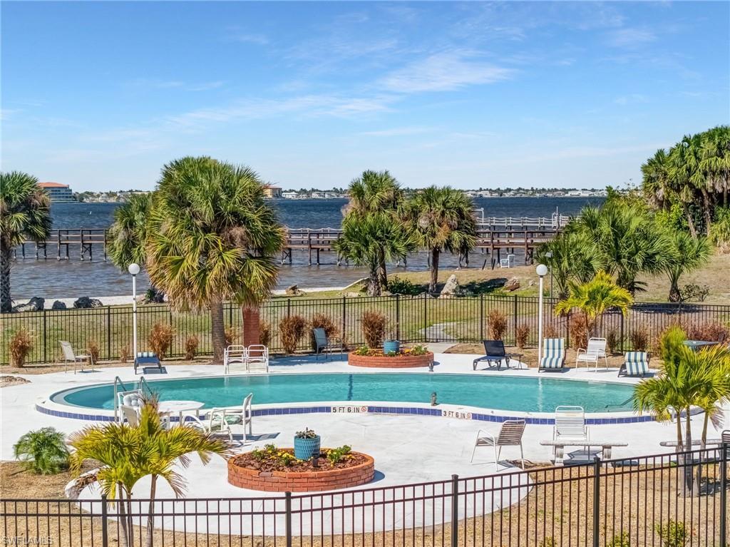 Image 2: Pool and private river beach amenities make it easy to enjoy the best of outdoor living.