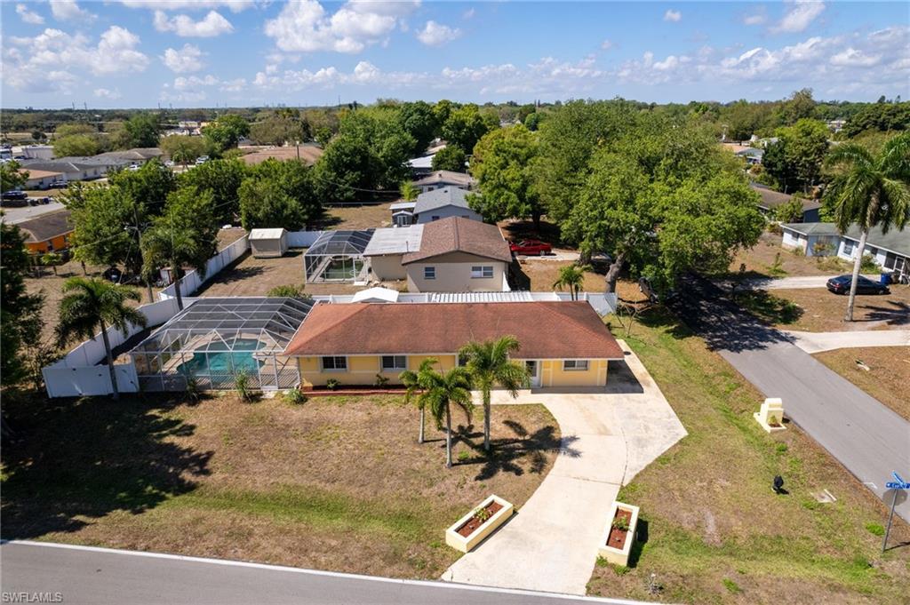 Image 2: Aerial view of front of home.
