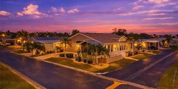 Image 3: Single story home with a front lawn