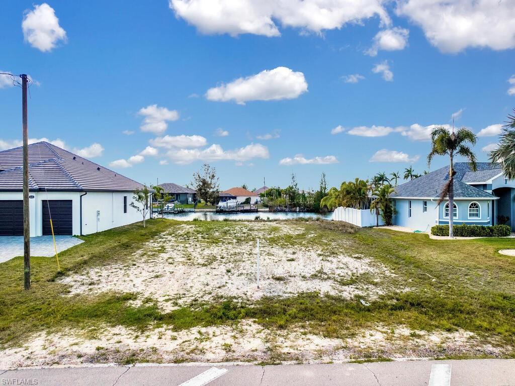 Image 1: View of yard with a residential view