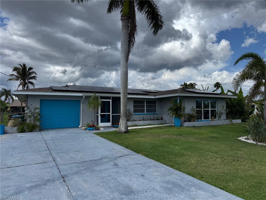 Image 4: Great curb appeal and park up to four cars on your double wide driveway.