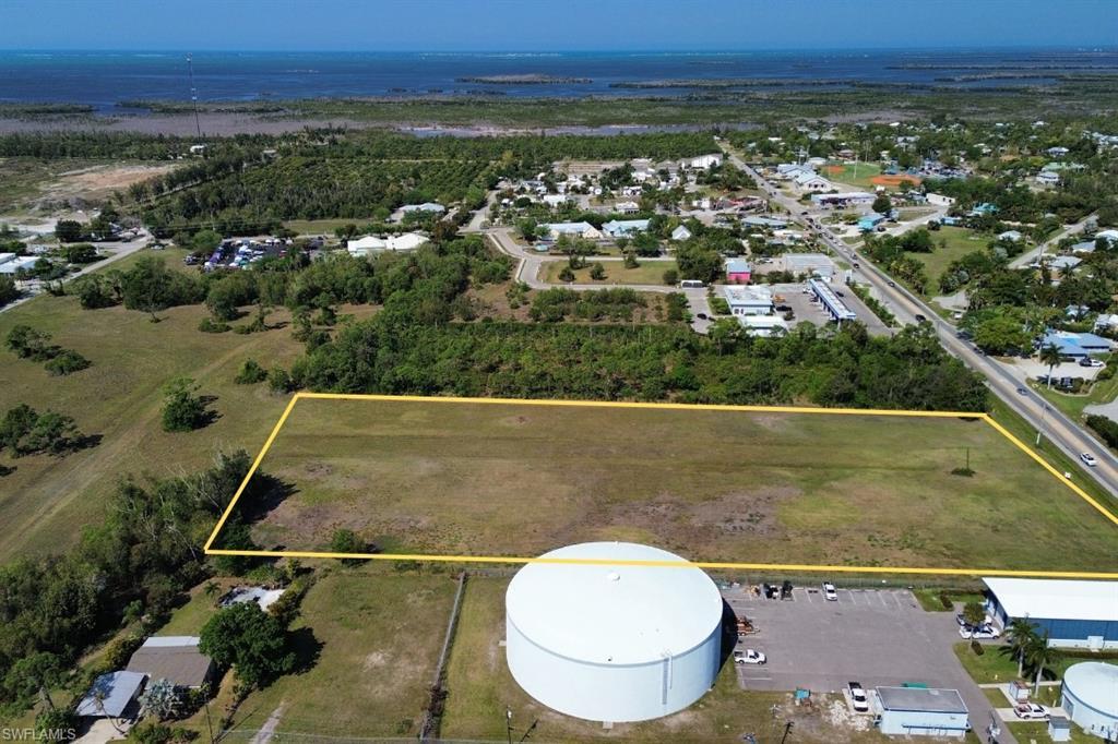 Image 2: Expansive undeveloped land parcel with a clear, level surface