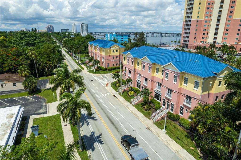 Image 3: This gated community offers concierge services, security, BBQ & picnic area, billiards, spectacular infinity pool with spa & hot tuboverlooking Caloosahatchee River (swim until10 pm!), dog park, fitness center, pickleball &tennis courts, library, theater, conference &storage rooms