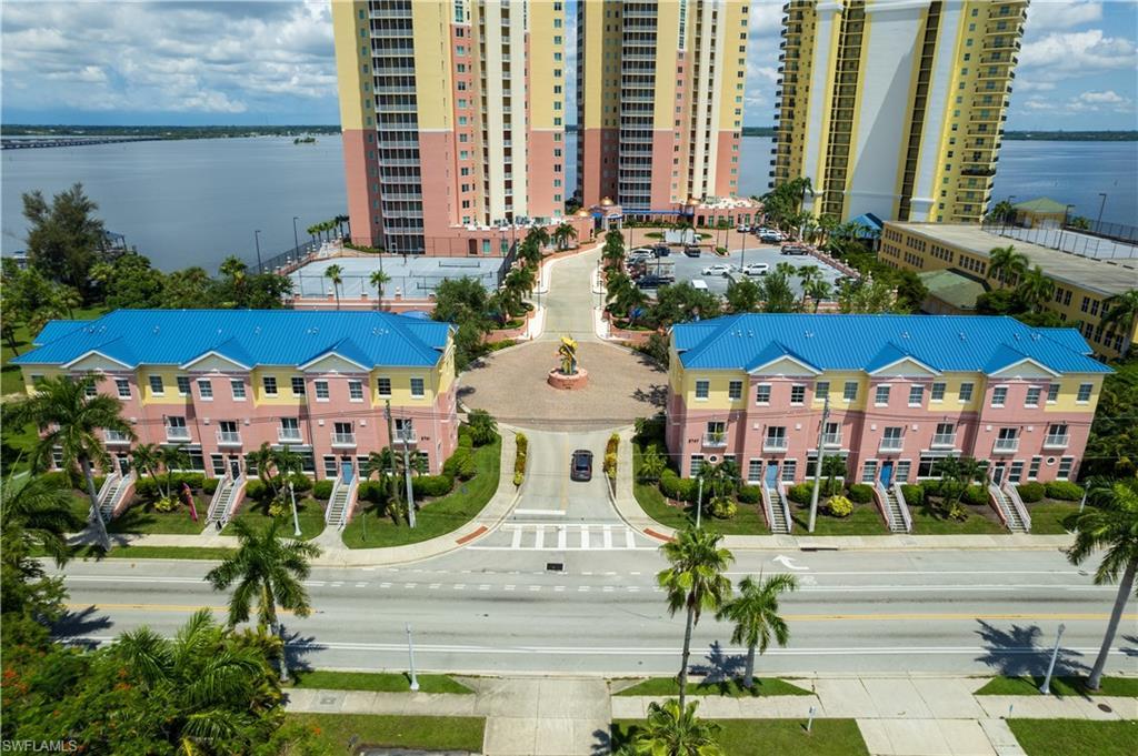 Image 4: This gated community offers one assignedcovered parking spot PLUS STORAGE ROOM; allfor hassle-free reasonable condo fees!