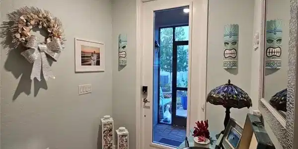 Image 3: Entry w/ Hurricane Glass door