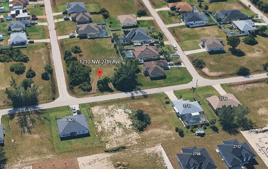 Image 2: View of property location featuring nearby suburban area
