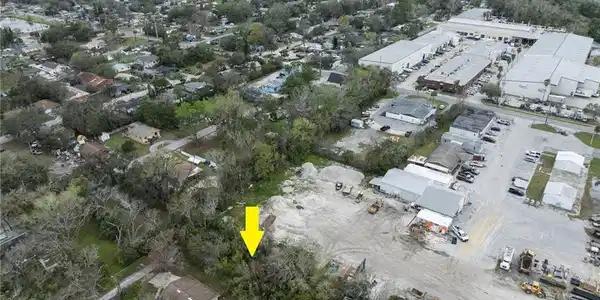 Image 4: Perfectly situated for BUILDING A CUSTOM HOME, this SPACIOUS PROPERTY measures 65 feet by 153 feet, providing 7,500 sq ft OF LAND TO BRING YOUR VISION TO LIFE!