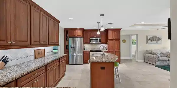 Image 3: Kitchen with an abundance of cabinets