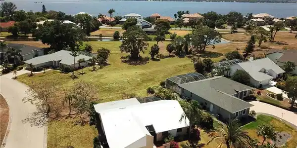 Image 2: Birds eye view of property with a residential view and a water view