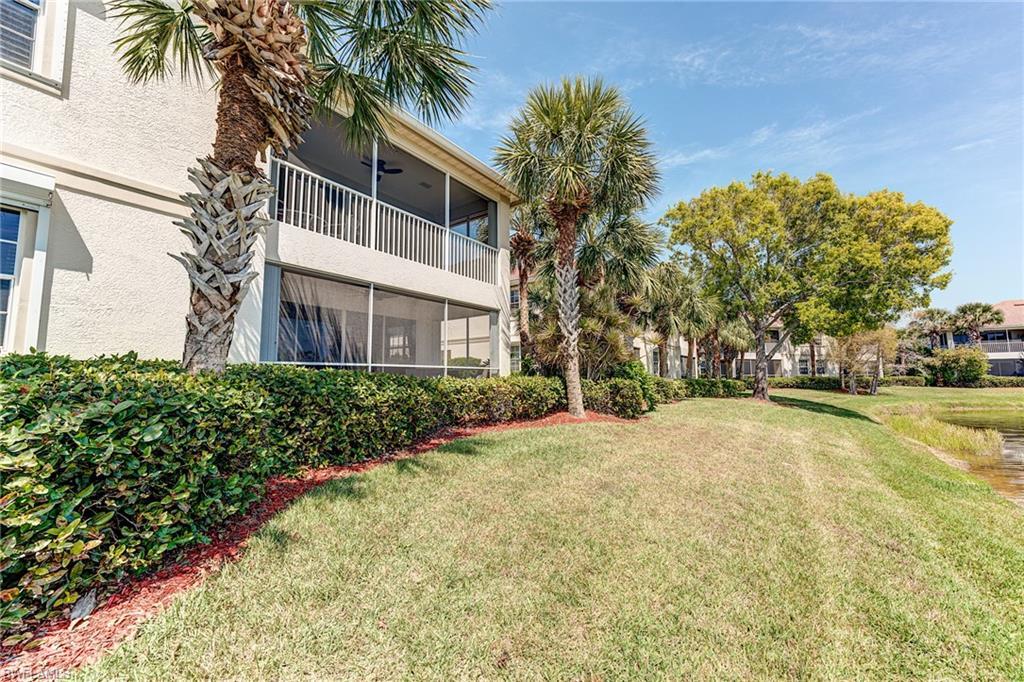 Image 3: Rear lawn area by lake