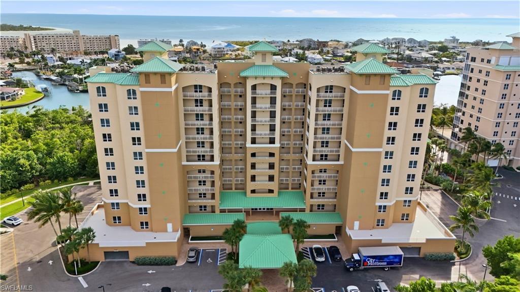 Image 3: View of apartment building / complex with a water view - Virtually Edited Image