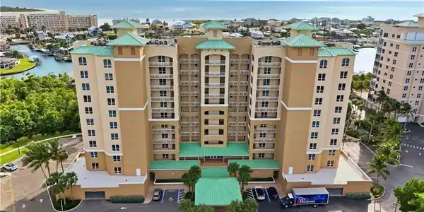 Image 3: View of apartment building / complex with a water view - Virtually Edited Image