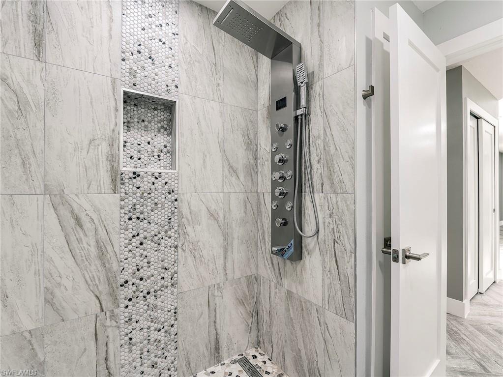 Image 4: Hall Bath, check out that shower!