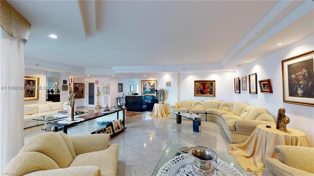 Image 3: Living room featuring recessed lighting and a raised ceiling