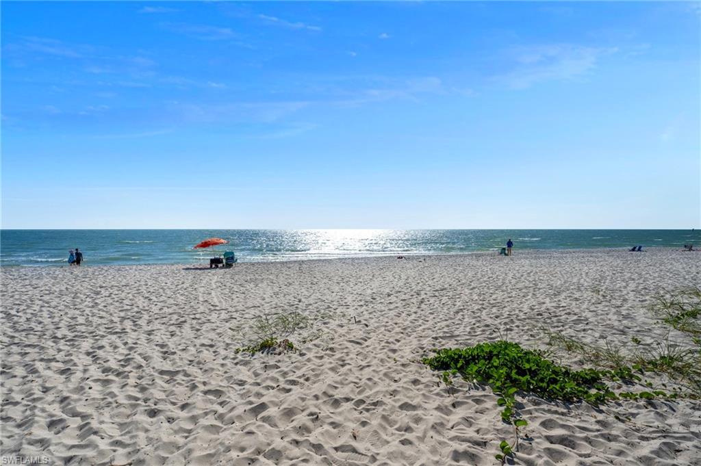 Image 1: Water view featuring local beach