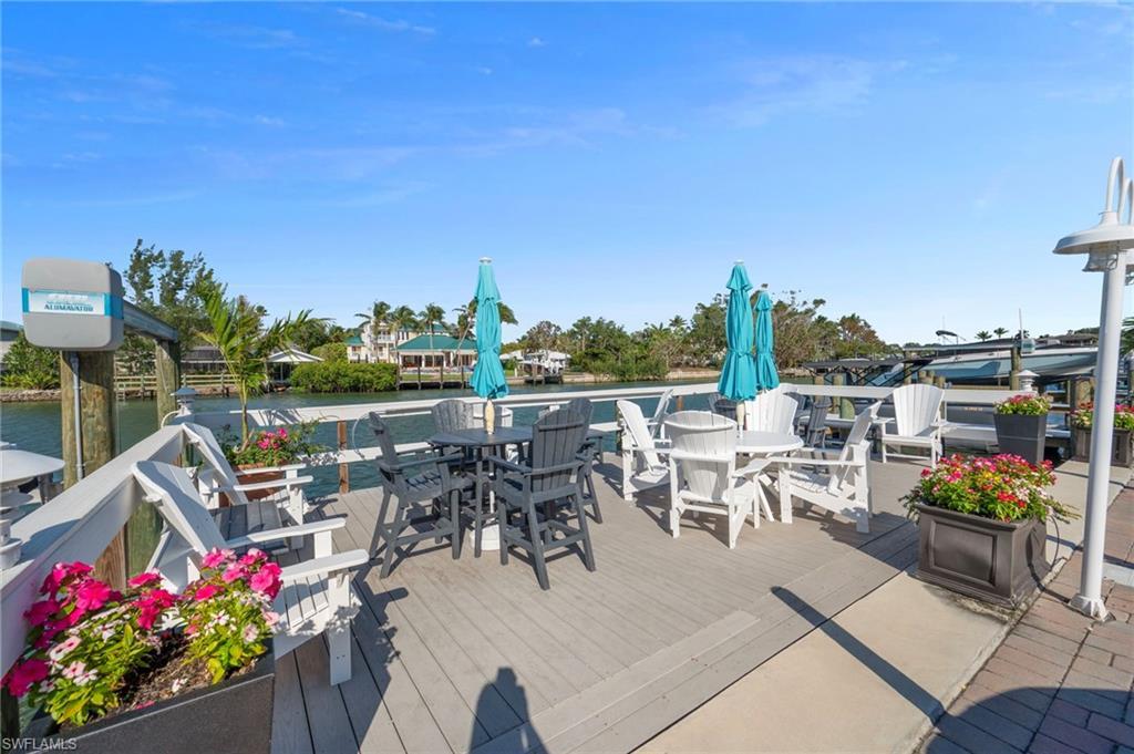 Image 4: Wooden terrace with a water view