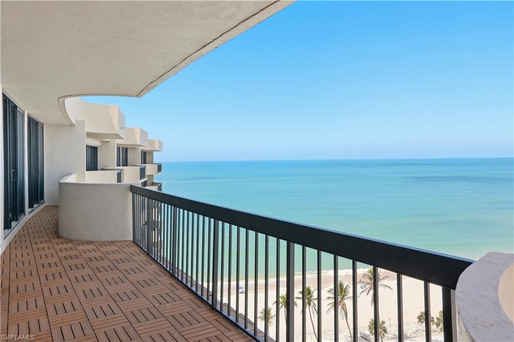 Image 2: Large lanai runs the entire length of the condo with beautiful views of the Gulf beach
