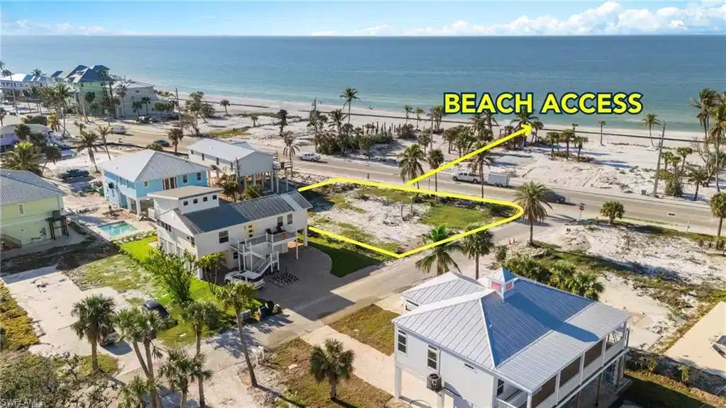 Image 1: BEACH GAZEBO & BEACH ACCESS Bird's eye view featuring a water view and a beach view VIRTUALLY EDITED