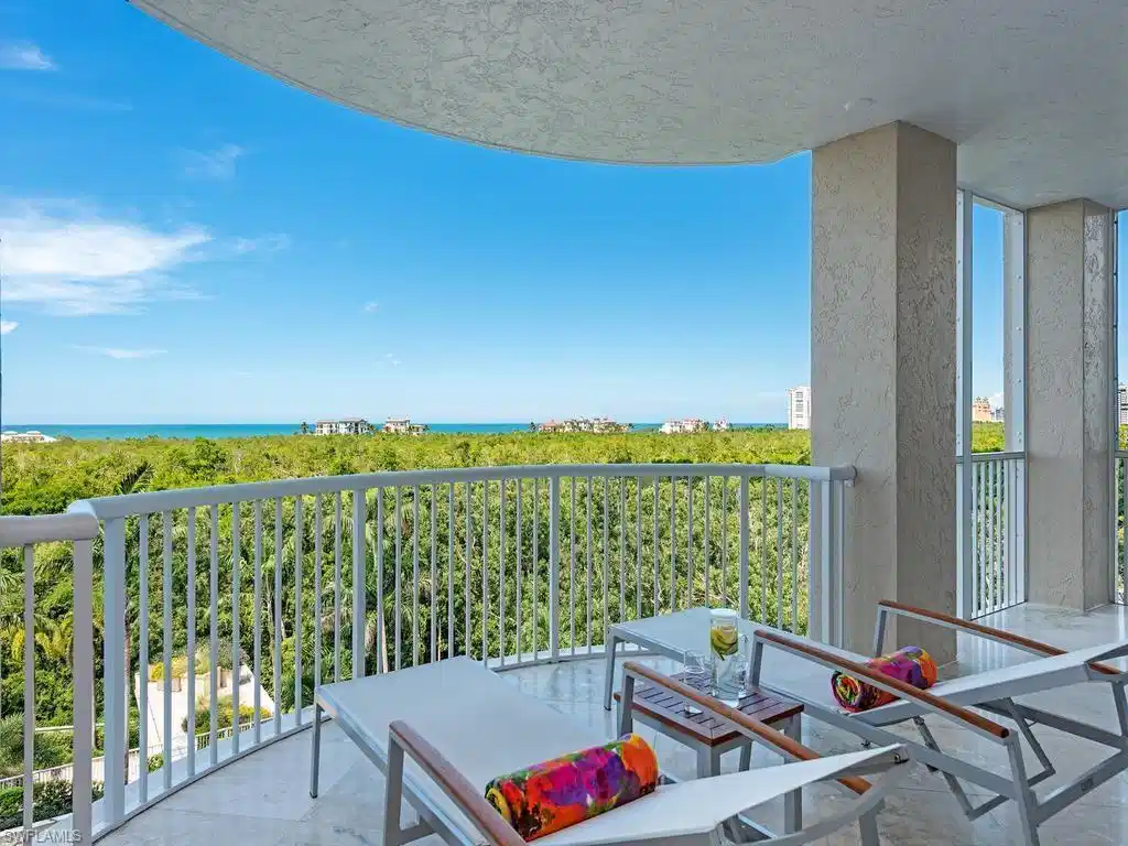 Image 1: Large balcony with panoramic Gulf, sunset views