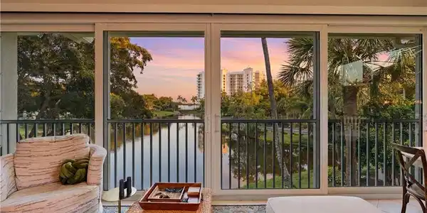 Image 2: Unwind with your favorite glass of wine and a breathtaking sunset.