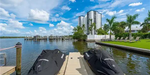 Image 4: Dock area featuring a water view - Virtually Edited Image