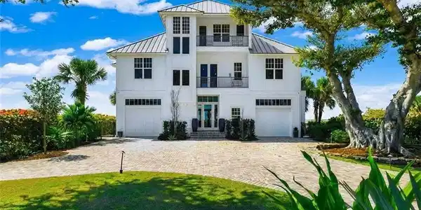 Image 3: Front of home with fabulous curb appeal - Virtually Edited