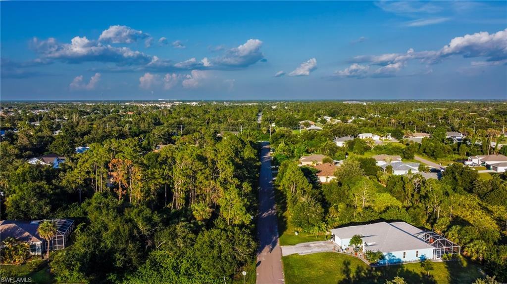 Image 4: Aerial view of property and surrounding area
