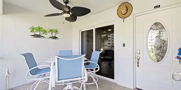 Image 2: View of patio / terrace featuring outdoor dining area and a ceiling fan