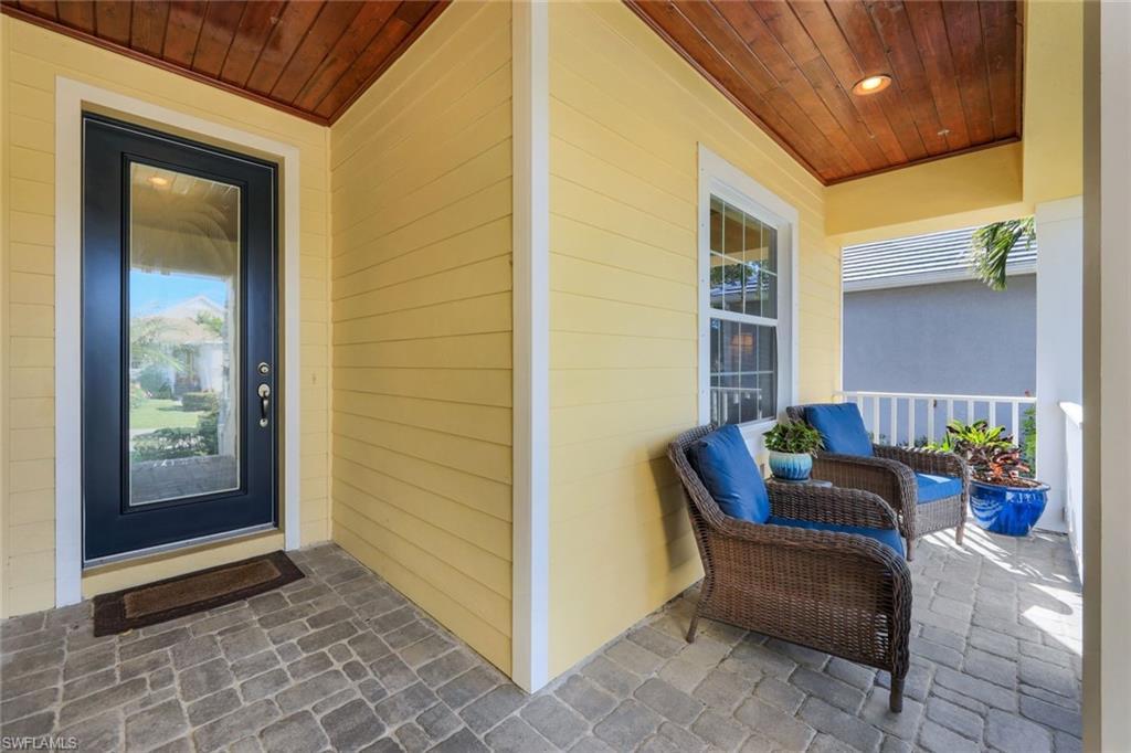 Image 4: Doorway to property with a porch