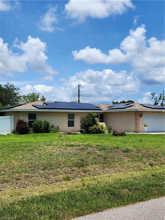 Image 4: Front of the house/Solar panels.