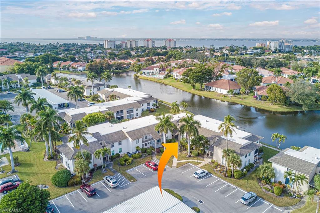 Image 3: View of urban area featuring a nearby body of water and nearby suburban area