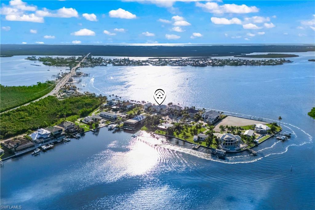 Image 4: Location, location, location!  Street of dreams with the best boating access to all the waterways and an island lifestyle yet still close to shopping and Cape Coral.