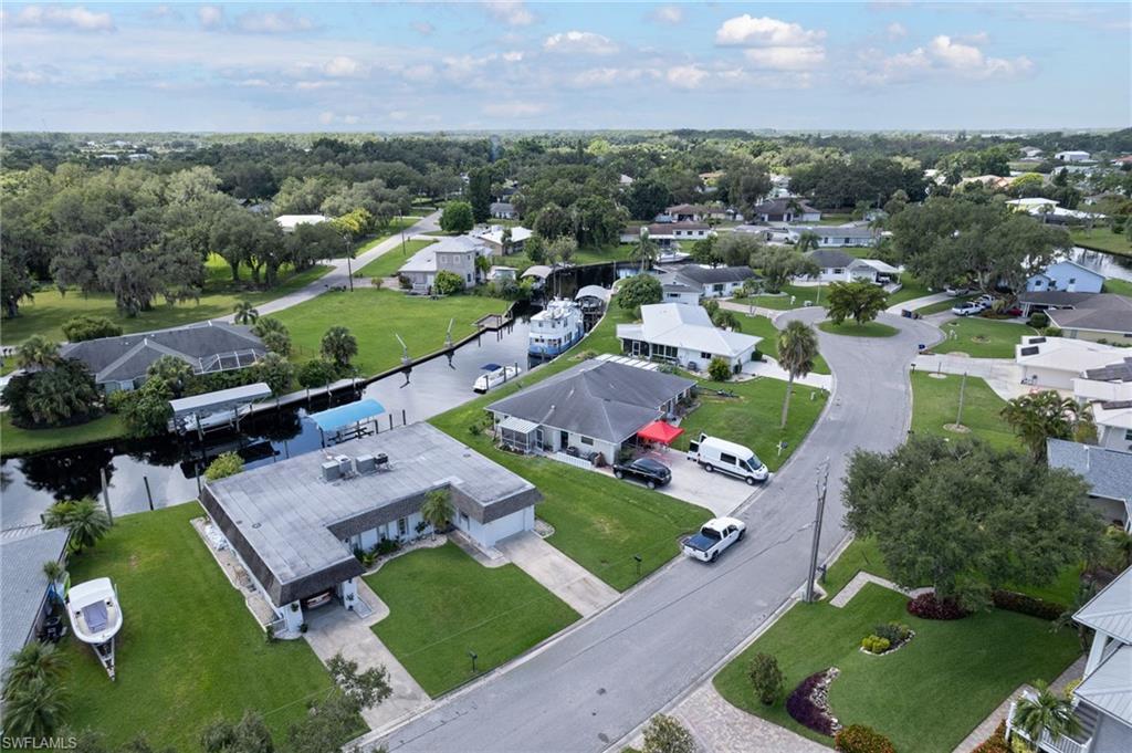 Image 4: Aerial overview of property's location with nearby suburban area