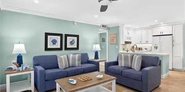 Image 4: Living room with recessed lighting, crown molding, light wood-style flooring, and ceiling fan