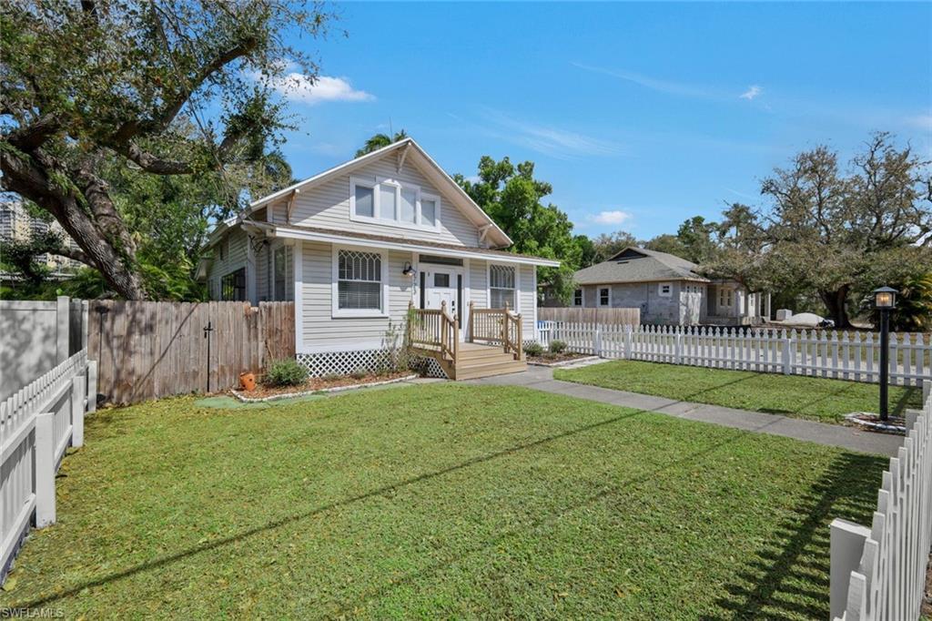 Image 4: Bungalow-style home featuring a gate