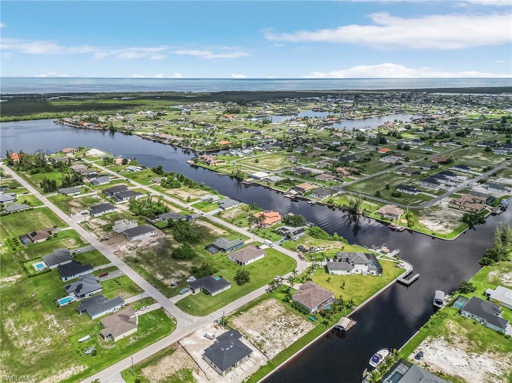 Image 4: Birds eye view of property with a water view