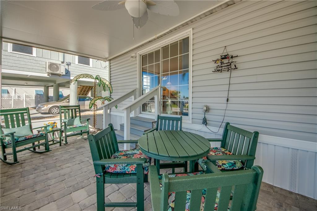 Image 4: Deck featuring a patio and ceiling fan