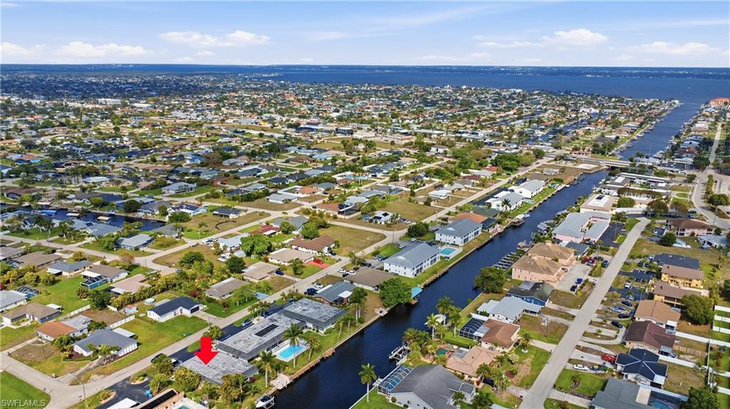 Image 2: Aerial perspective of suburban area with views of the Caloosahatchee River