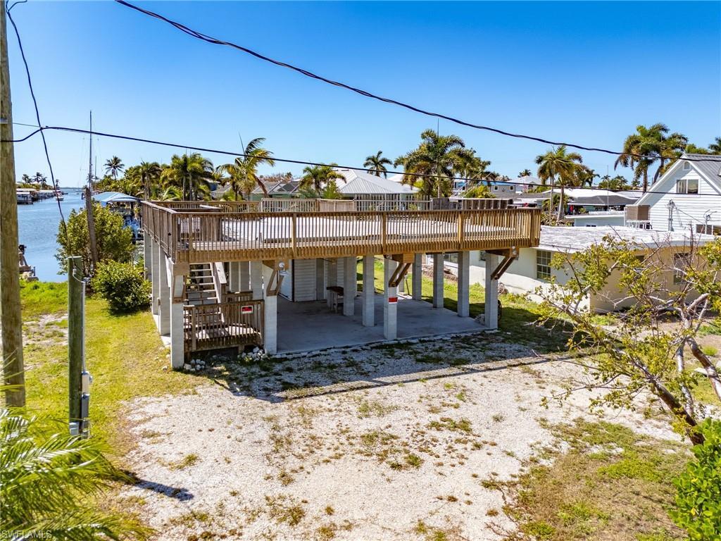 Image 2: Front of property.  Existing concrete piling foundation