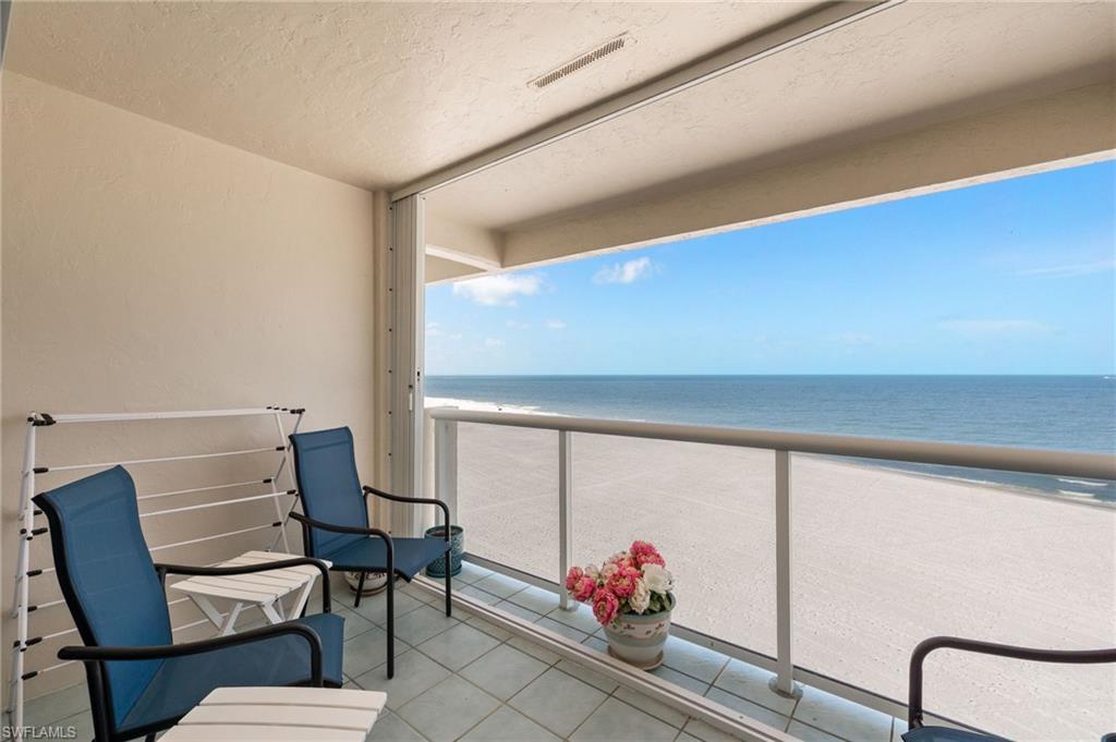 Image 1: Private balcony featuring a glass railing system and tile flooring