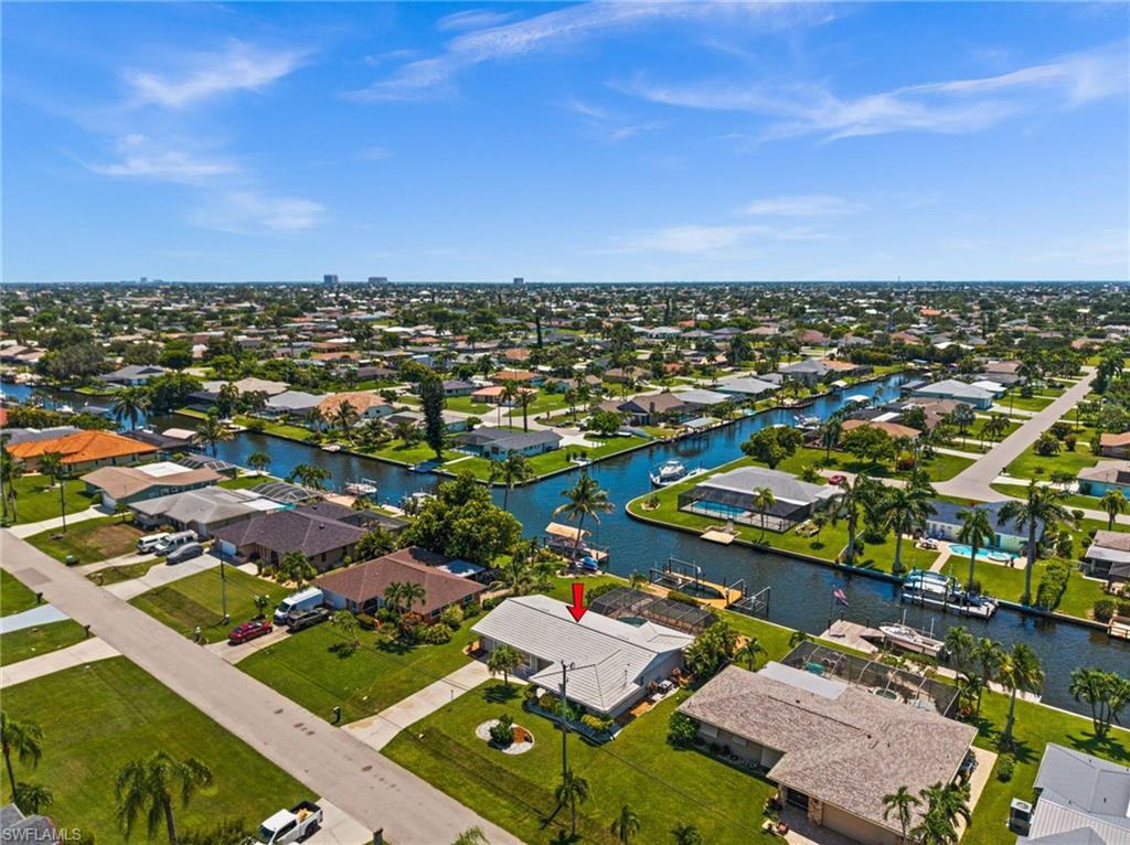Image 1: Intersecting Canal view at 4102 SE 1st Pl