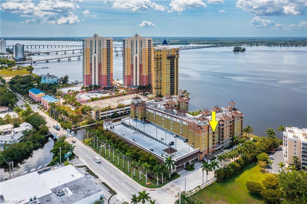 Image 1: Birds eye view of property with a water view
