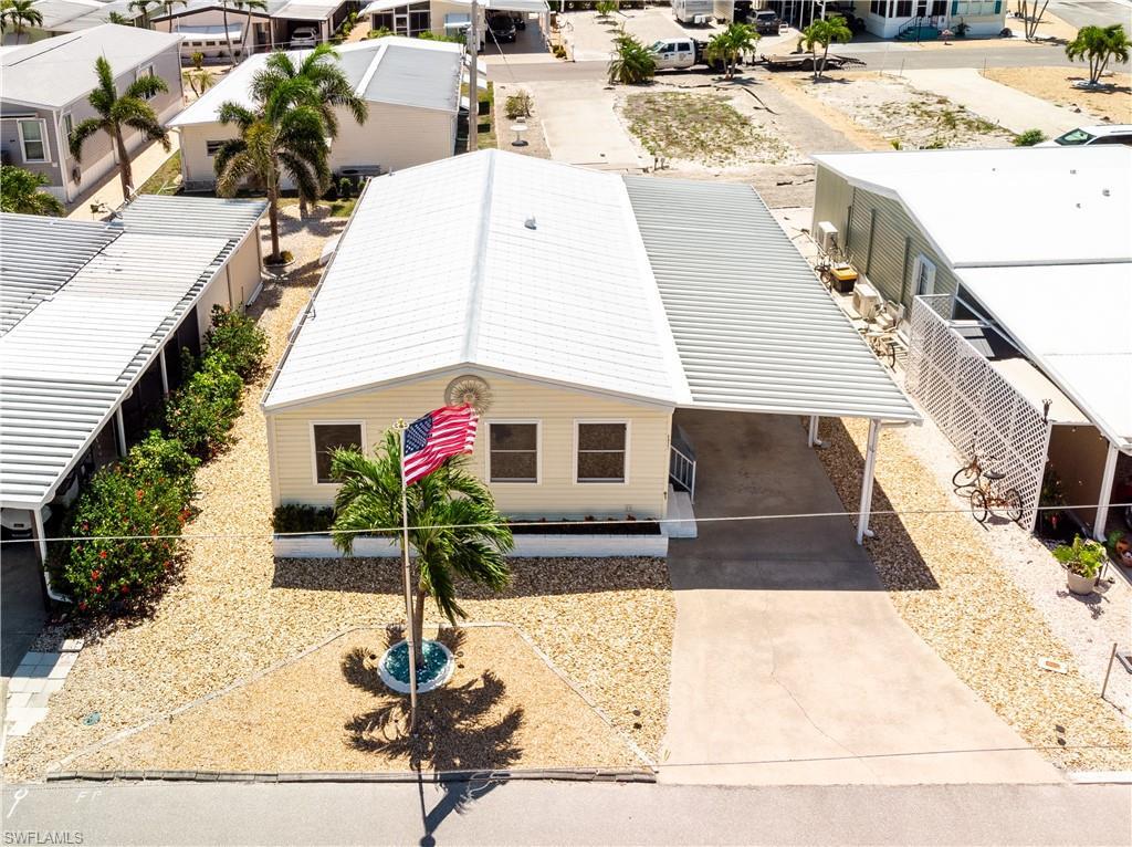 Image 2: Birds eye view of property with a residential view