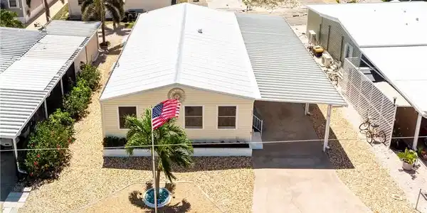 Image 2: Birds eye view of property with a residential view