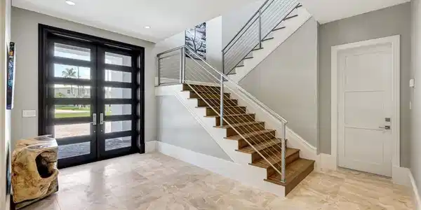 Image 3: Entrance foyer featuring french doors, stairway, marble finish floors, baseboards, and recessed lighting
