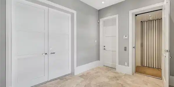Image 4: Front entry with elevator  ground level